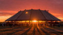 Roskilde Orange Stage iconic canopy during sunset